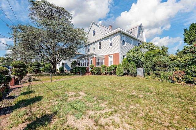 exterior space featuring a yard