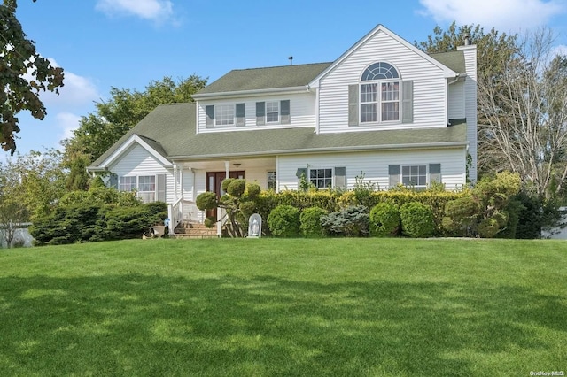 view of front of house with a front lawn