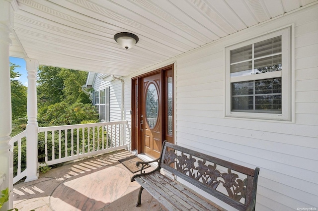 doorway to property with a porch