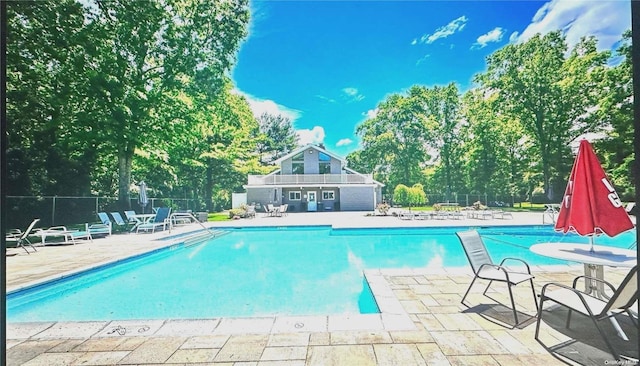 view of pool featuring a patio