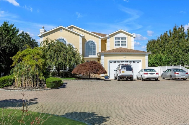 view of property with a garage