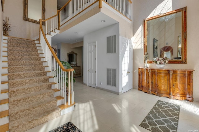 entryway featuring a high ceiling