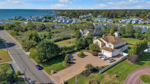 bird's eye view with a water view