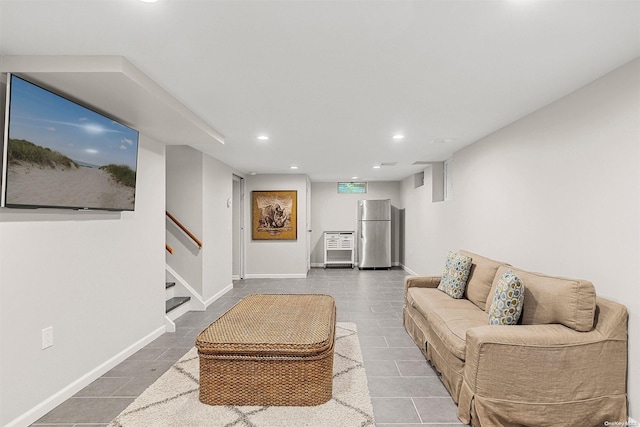 living room with tile patterned floors