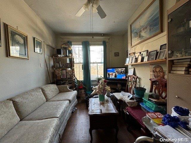 living room with ceiling fan