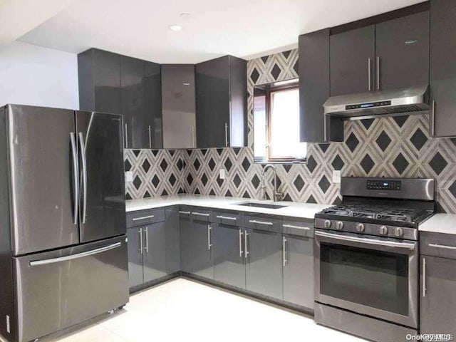 kitchen featuring backsplash, sink, stainless steel appliances, and range hood