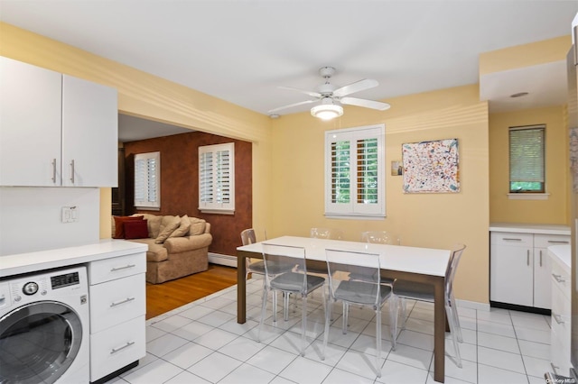 215 Middle Neck Rd Unit 16-1A, Great Neck, NY 11021 - dining area with washer / dryer, ceiling fan, and light tile patterned flooring