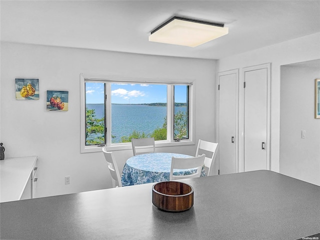 dining area with a water view