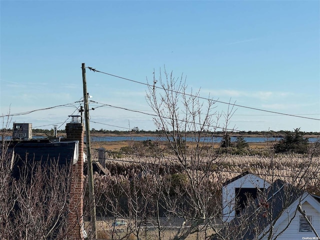 view of yard with a water view