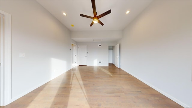 interior space with ceiling fan and light hardwood / wood-style floors