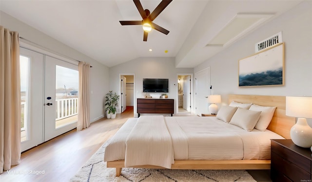 bedroom with ceiling fan, ensuite bathroom, lofted ceiling, access to outside, and light wood-type flooring