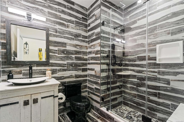 100 Garvies Point Rd Unit 1309, Glen Cove, NY 11542 - full bath featuring vanity, toilet, and a shower stall