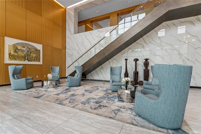 100 Garvies Point Rd Unit 1309, Glen Cove, NY 11542 - common area with a towering ceiling