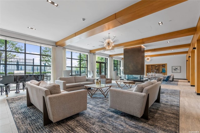 tiled living room featuring beam ceiling and an inviting chandelier