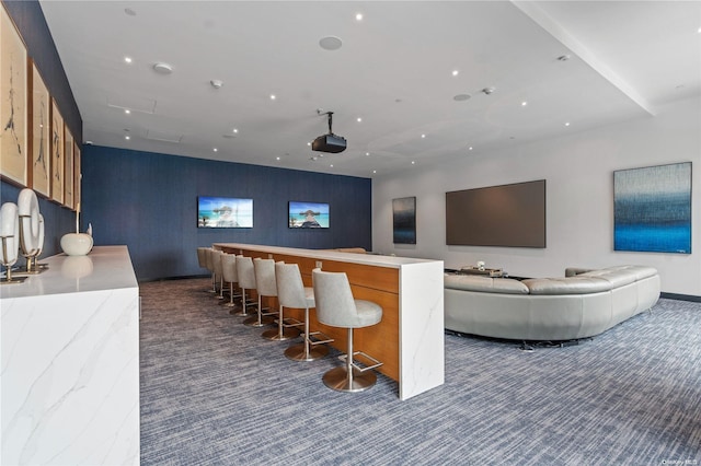 100 Garvies Point Rd Unit 1309, Glen Cove, NY 11542 - home theater room with carpet floors and a dry bar