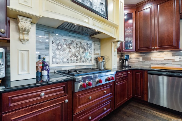 kitchen featuring backsplash, stainless steel appliances, dark hardwood / wood-style floors, and custom exhaust hood