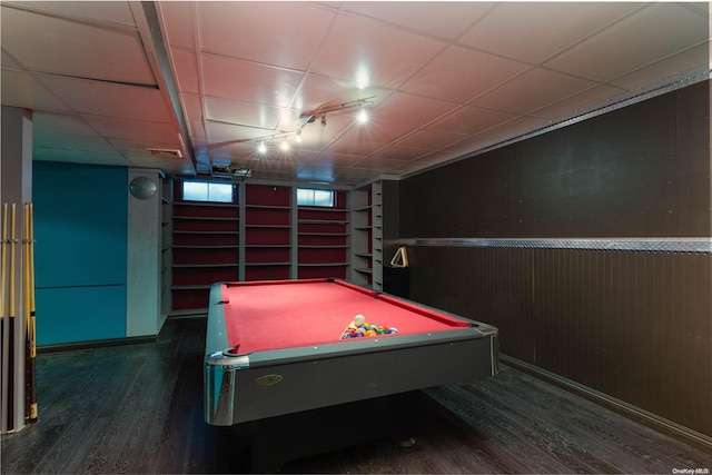 game room with dark hardwood / wood-style floors, wooden walls, and billiards