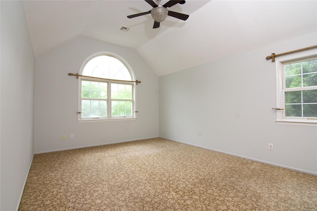 25 Whispering Woods Dr, Smithtown, NY 11787 - spare room with carpet floors, plenty of natural light, a ceiling fan, vaulted ceiling, and baseboards