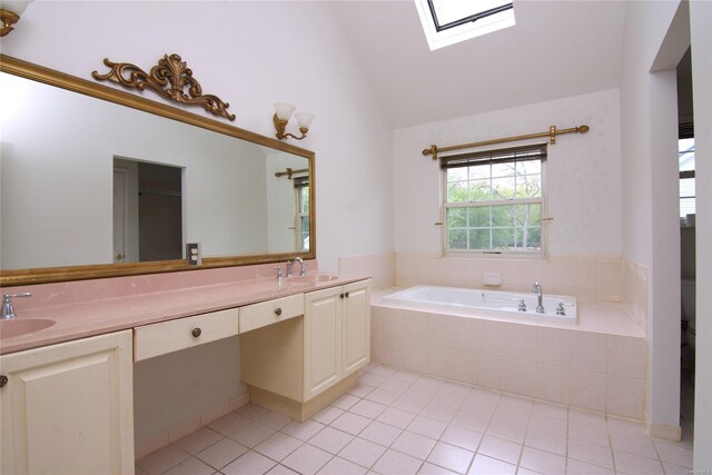 25 Whispering Woods Dr, Smithtown, NY 11787 - full bath featuring a skylight, lofted ceiling, tile patterned floors, a garden tub, and double vanity