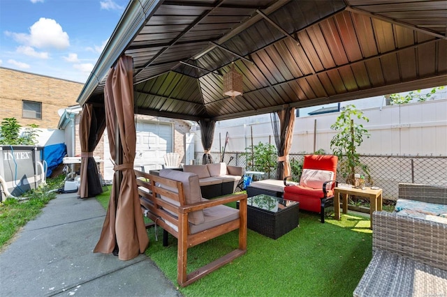 view of patio / terrace with a gazebo and an outdoor hangout area