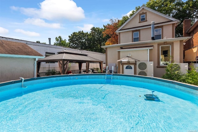 view of pool with a gazebo