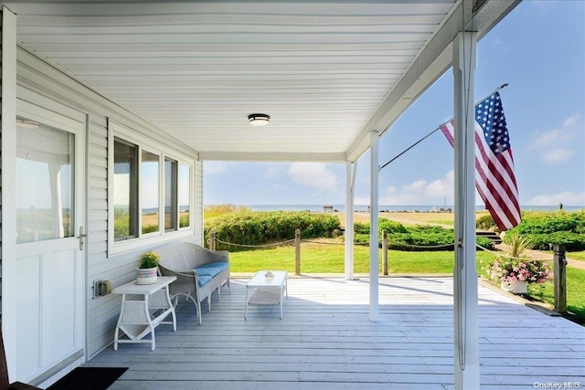 wooden terrace with covered porch