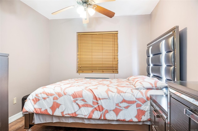 bedroom featuring ceiling fan and hardwood / wood-style floors