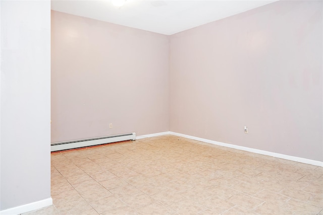 unfurnished room featuring a baseboard radiator