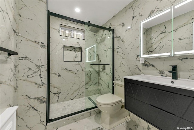 bathroom with vanity, toilet, tile walls, and walk in shower