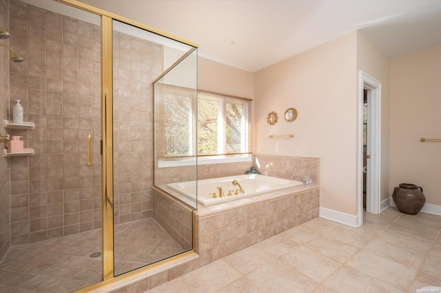 bathroom with tile patterned flooring and shower with separate bathtub