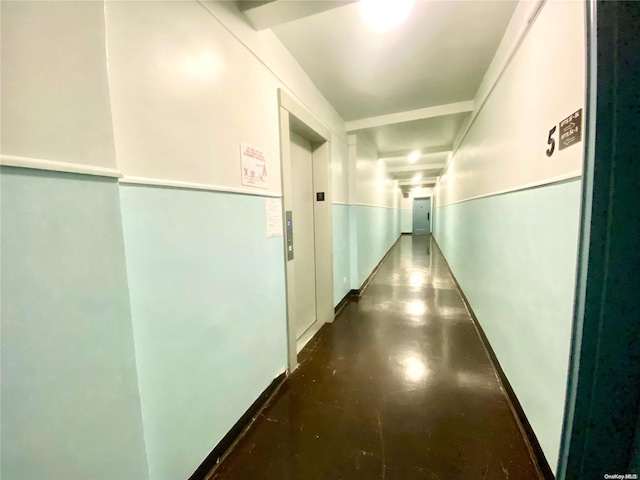 hallway featuring elevator