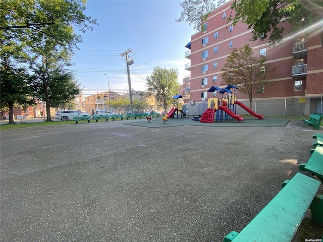 view of jungle gym featuring a wall mounted AC