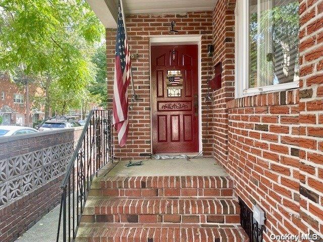 doorway to property featuring a porch