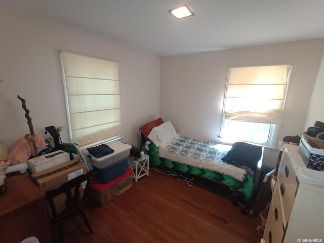 bedroom featuring wood-type flooring