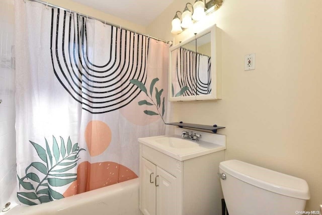 full bathroom with shower / bath combo with shower curtain, vanity, and toilet