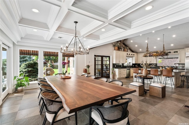 dining space featuring beam ceiling, ornamental molding, french doors, and a chandelier