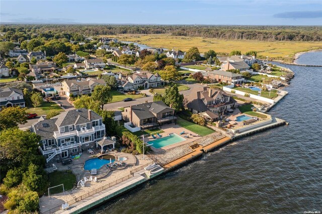 8 Shoal Dr, West Islip, NY 11795 - aerial perspective of suburban area with a pool and a nearby body of water