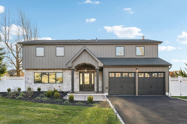 8 Shoal Dr, West Islip, NY 11795 - modern inspired farmhouse with an attached garage, driveway, and a shingled roof