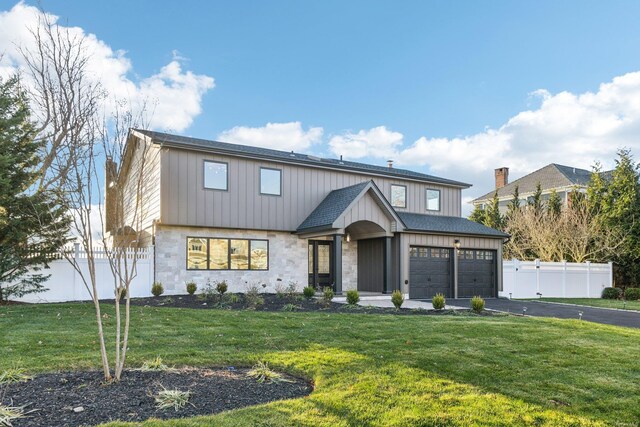 8 Shoal Dr, West Islip, NY 11795 - modern inspired farmhouse featuring driveway, a garage, stone siding, and board and batten siding