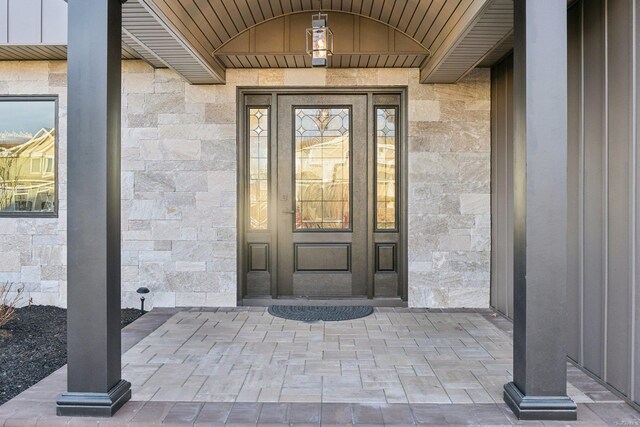 8 Shoal Dr, West Islip, NY 11795 - doorway to property featuring stone siding