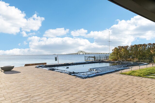8 Shoal Dr, West Islip, NY 11795 - view of swimming pool with a water view