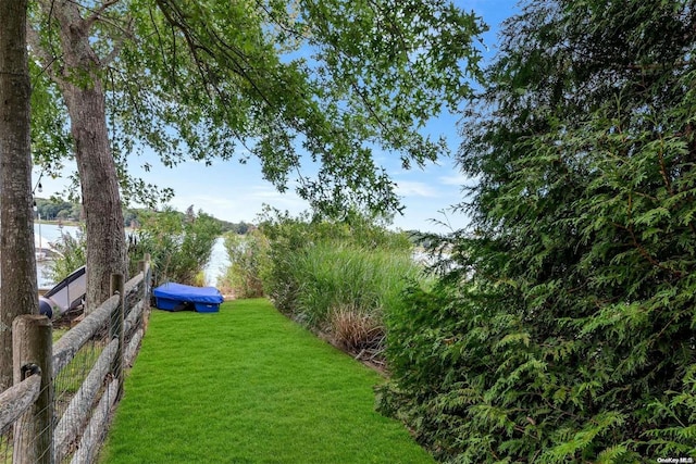 view of yard with a water view