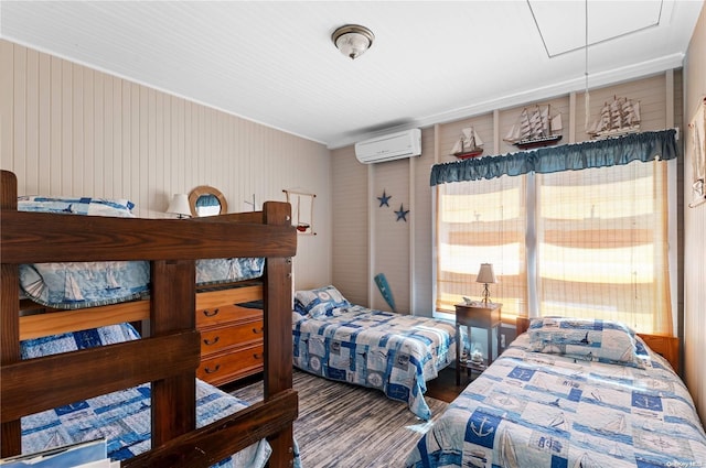29 Ocean Rd, Ocean Beach, NY 11770 - bedroom with wood walls, a wall mounted air conditioner, and hardwood / wood-style flooring