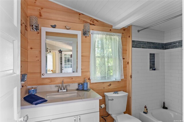 29 Ocean Rd, Ocean Beach, NY 11770 - full bathroom with wooden walls, lofted ceiling with beams, tiled shower / bath, and a healthy amount of sunlight