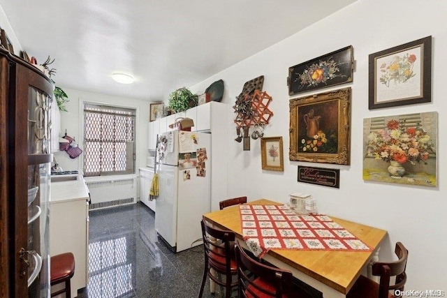 dining space with radiator