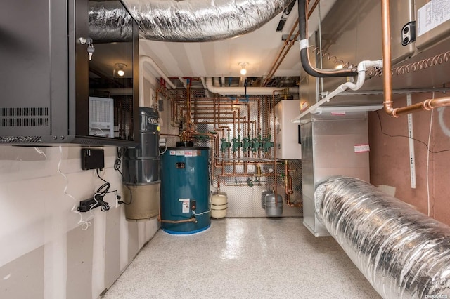 utility room featuring water heater