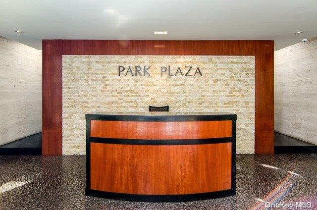 61-15 97th St Unit 5A, Rego Park, NY 11374 - reception area featuring a fireplace and a surveillance system