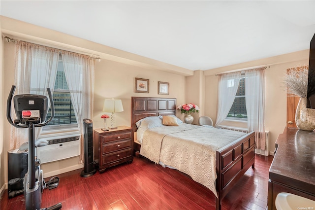 61-15 97th St Unit 5A, Rego Park, NY 11374 - bedroom featuring dark wood-style flooring and baseboards