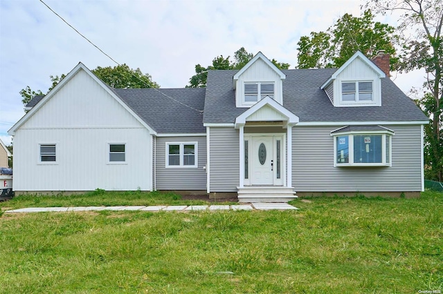 view of front of property with a front lawn