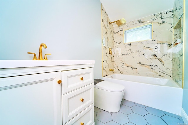 full bathroom with tile patterned floors, vanity, toilet, and tiled shower / bath